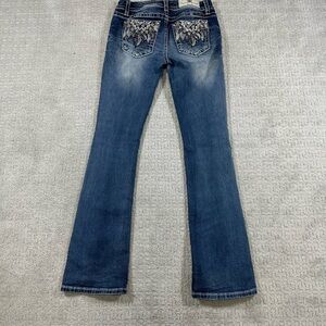 Woman’s Blue Miss me Jeans 27” waist
